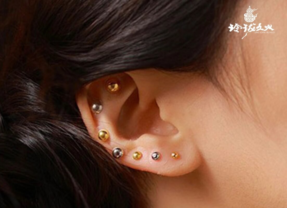 24k gold wellness jewelry ear seeds close up